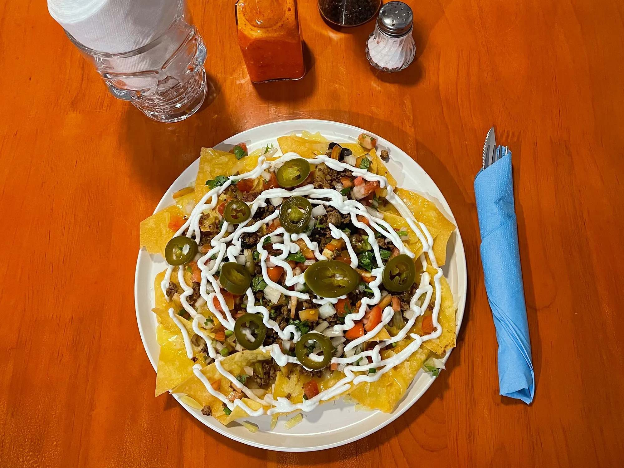 Loaded nachos with pico de gallo and sour cream at La Casita, Mexican restaurant Chiang Mai